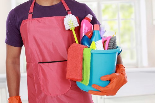 Janitorial staff performing commercial cleaning in a workplace