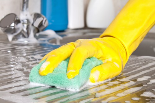 Bright kitchen being cleaned in a Docklands home