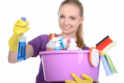 Cleaner maintaining shared hallway and stairwell area